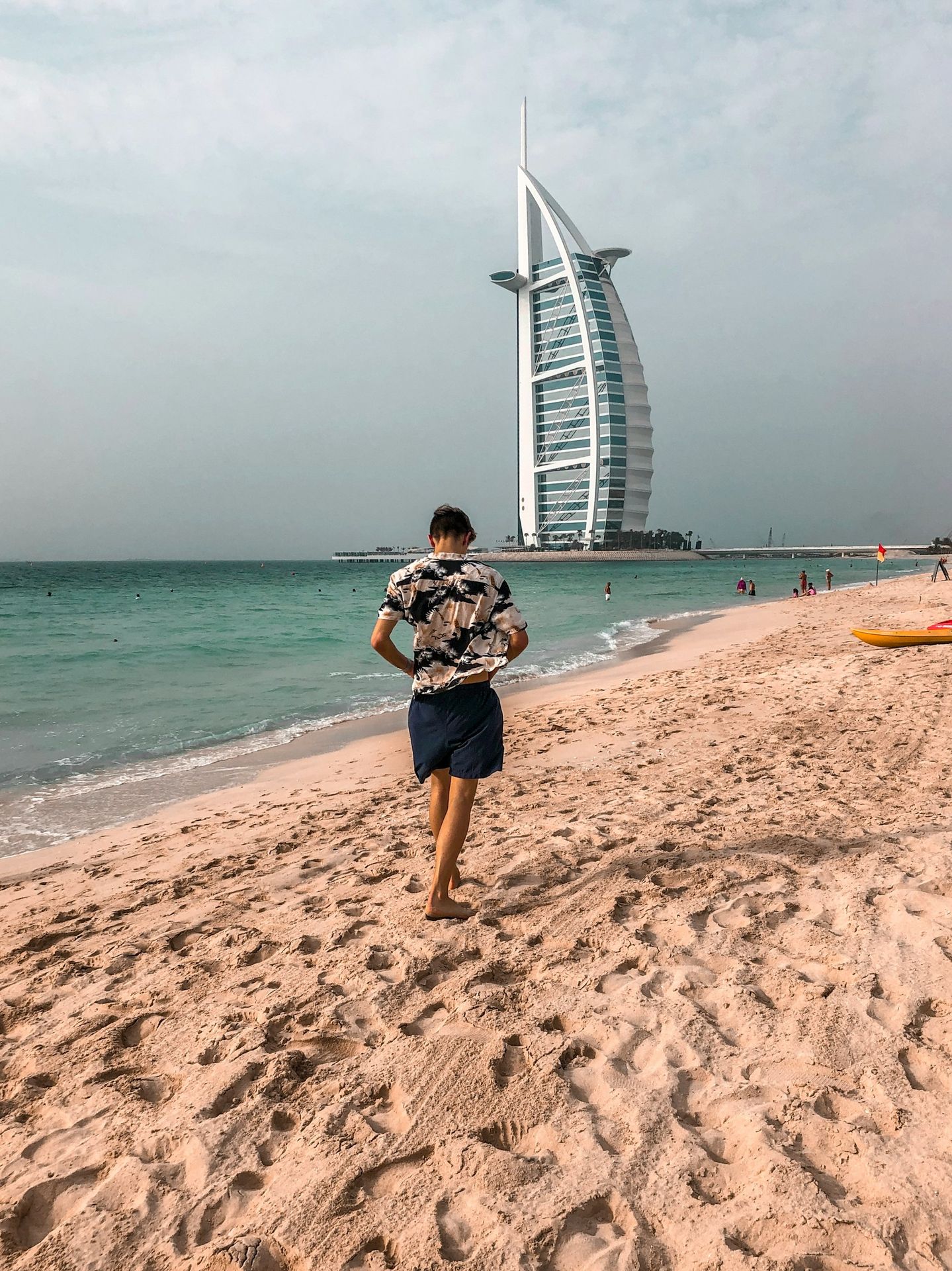 person walking on seasore